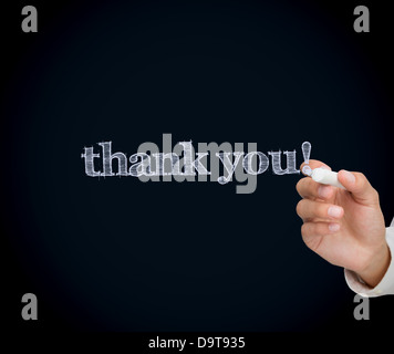 Woman writing thank you with a chalk Stock Photo - Alamy