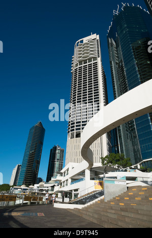 Modern high-rise buildings at Eagle Street Pier beside river in Brisbane CBD Queensland Australia Stock Photo