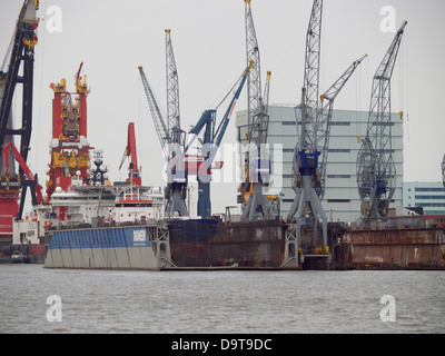 Damen shipyards drydock with ship in it, in the port of Rotterdam, the Netherlands Stock Photo