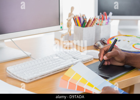 Designer using graphics tablet in the office Stock Photo - Alamy