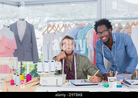 Fashion designers working together in a creative office Stock Photo
