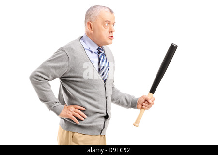 Angry middle aged man holding a baseball bat Stock Photo