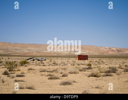 car and trailer in the desert Stock Photo