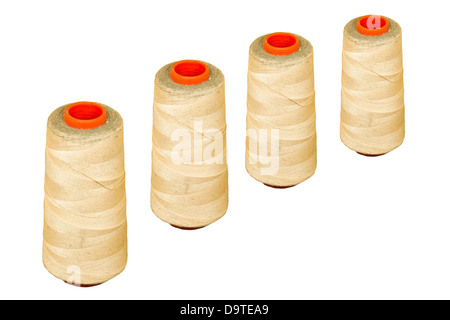 four spool of thread isolated on white background Stock Photo