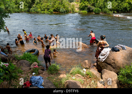 CAMBODIA Girls taking a bath Stock Photo - Alamy