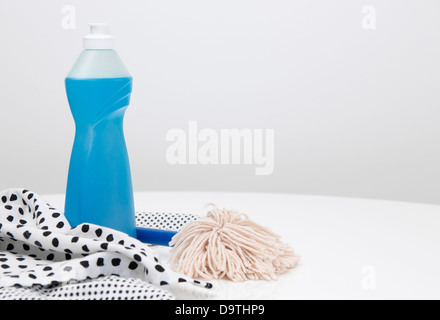 Dishwashing liquid, kitchen towels and soft brush for washing dishes. Stock Photo