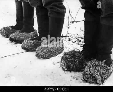 Propaganda text of National Socialist report on the back of the picture:  'From the Eastern front. Almost seven-league boots, but they keep warm and are very cheap'. Motive from the Eastern front on the 23rd of January in 1942. The attack of the German Wehrmacht on the Soviet Union on the 22nd of June in 1941 was going under the alias 'Operation Barbarossa'.    Fotoarchiv für Zeitgeschichte Stock Photo