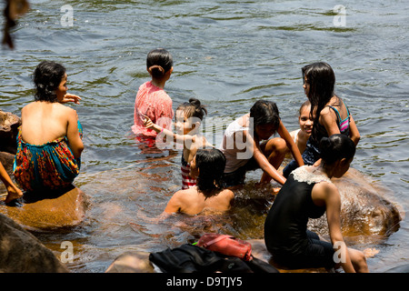 CAMBODIA Girls taking a bath Stock Photo - Alamy