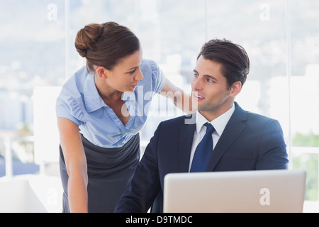 Business people look at each other and smiling Stock Photo