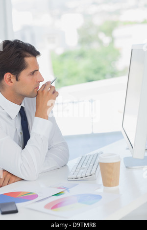 Businessman focused on the computer Stock Photo
