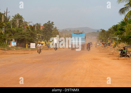 Dusty Country Road in the Province of Kampot, Cambodia Stock Photo