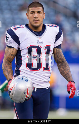 June 26, 2013, - Aaron Hernandez arrested in connected with the death of Odin Lloyd and then released by the New England Patriots. PICTURED: August 29, 2012: New England Patriots tight end Aaron Hernandez (81) looks on with his helmet in hand during warm-ups prior to the NFL preseason game between the New England Patriots and the New York Giants at MetLife Stadium in East Rutherford, New Jersey. Stock Photo