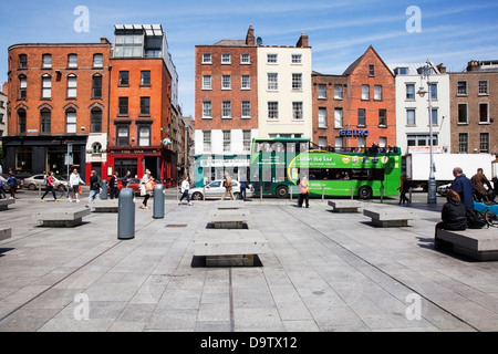 Pedestrians and vehicles on dame street;Dublin city county dublin ireland Stock Photo