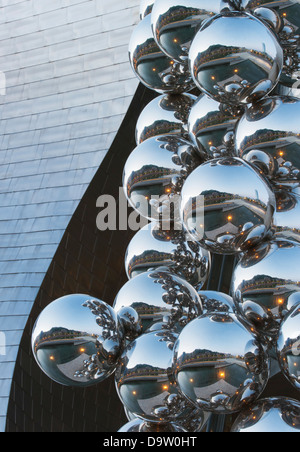 The Tall Tree and The Eye sculpture by Anish Kapoor next to the ...