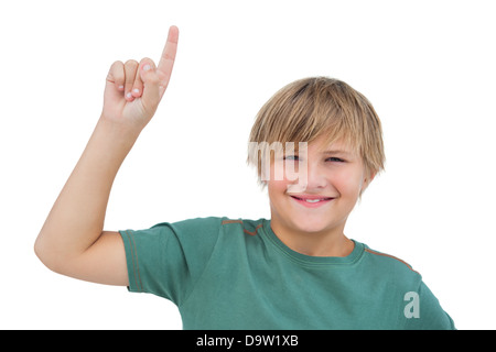 Little boy pointing upwards Stock Photo