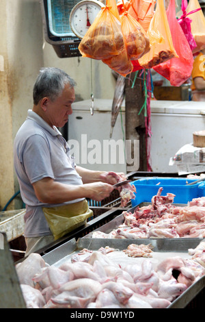 a man in a market Stock Photo