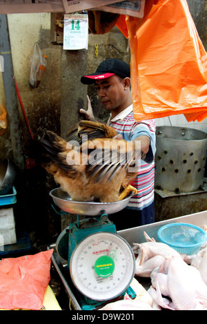 a man in a market Stock Photo