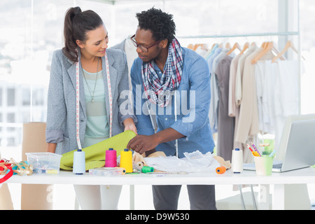 Two fashion designers working together in the office Stock Photo