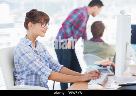 Group of designers working in their office Stock Photo