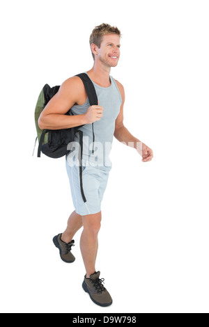 Handsome man in sportswear walking Stock Photo