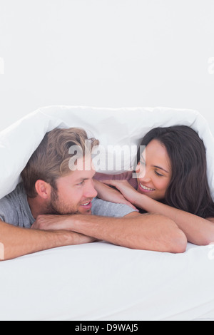 Close couple under the cover Stock Photo