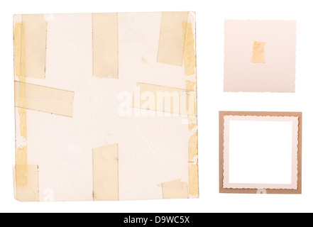 Collection of old photo frames, edges and backings with sticky tape isolated on white Stock Photo