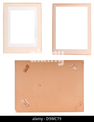 Collection of old photo frames, edges and backings with sticky tape isolated on white Stock Photo