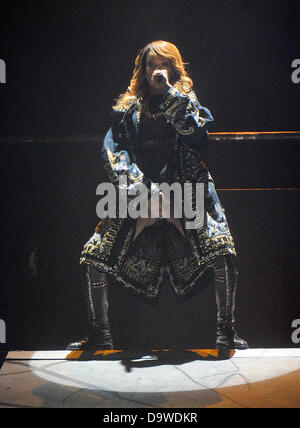 Cologne, Germany. 26th June, 2013. US singer Rihanna performs on stage during a concert at Lanxessarena in Cologne, Germany, 26 June 2013. During her Germany tour, Rihanna performs in Cologne, Berlin and Hanover. Photo: Henning Kaiser Stock Photo