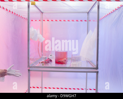 sterile chamber in a containment tent with a purple and blue background ...