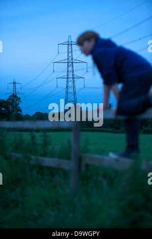 a young boy and pylons Stock Photo
