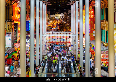 South East Asia, Singapore, Chinatown, Busy night market and MTR subway entrance Stock Photo