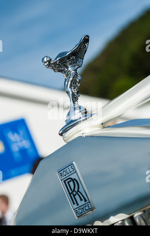 The statuette Spirit of Ecstasy on the radiator grille of a classic Rolls Royce car Stock Photo