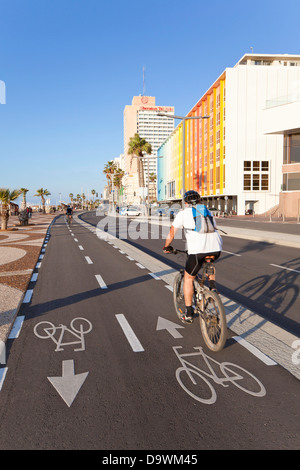 Middle East, Israel, Tel Aviv, beachfront promenade in front of the colourfully decorated hotel facades Stock Photo