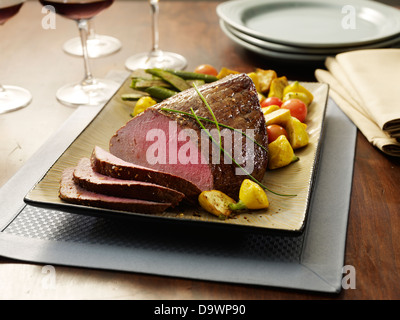 top round roast netted cut Stock Photo