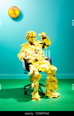 man covered in sticky notes Stock Photo