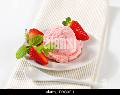 Scoop of strawberry ice cream - studio shot Stock Photo