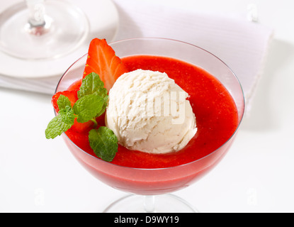 Ice cream with strawberry puree in coupe Stock Photo