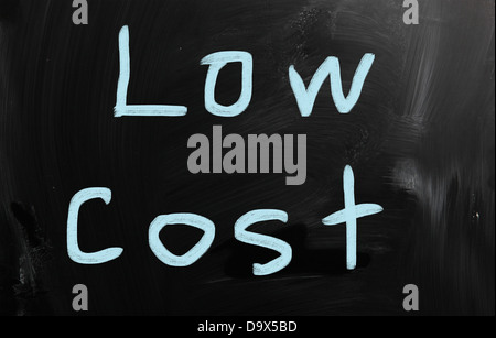 Low cost handwritten with white chalk on a blackboard Stock Photo