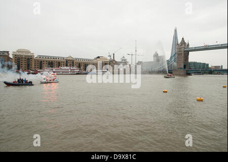 London, UK. 27th June 2013. The 4 man Islanders team shatter the round Britain GB Row and take first prize of £100,000.00. Credit:  Malcolm Park/Alamy Live News Stock Photo