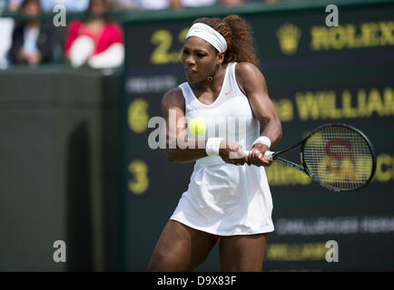 London, UK. 27th June 2013. Wimbledon Tennis Championships 2013 held at The All England Lawn Tennis and Croquet Club, London, England, UK.    Serena Williams (USA) [1] (in orange shorts) v Caroline Garcia (FRA) on No 1 Court. Credit:  Duncan Grove/Alamy Live News Stock Photo