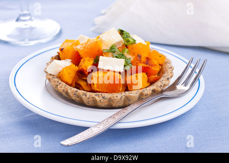 Small cheese pumpkin pie on plate Stock Photo