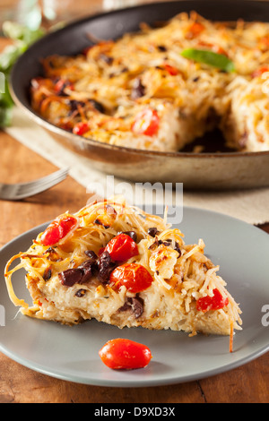 Homemade Baked Pasta Pie with Tomato and Basil Stock Photo
