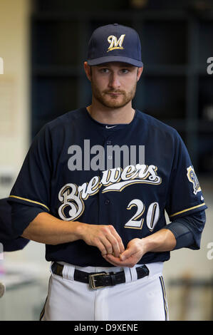 Milwaukee, Wisconsin, USA. 27th June, 2013. June 27, 2013: Milwaukee Brewers catcher Jonathan Lucroy #20 in the dugout during the Major League Baseball game between the Milwaukee Brewers and the Chicago Cubs at Miller Park in Milwaukee, WI. The Cubs won, 7-2. John Fisher/CSM. Credit: csm/Alamy Live News Stock Photo