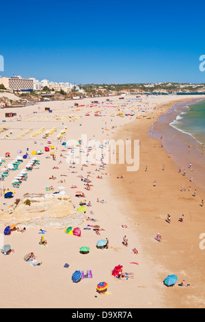Sunbathers on Praia Da Rocha Beach Portimao Algarve Portugal EU Europe Stock Photo