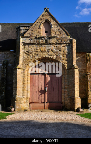 The door into the tithe barn at Abbotsbury Dorset UK Stock Photo