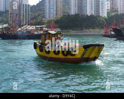 dh Aberdeen Harbour ABERDEEN HONG KONG Hong Kong junk Woman using mobile telephone sampan phone chinese boat Stock Photo