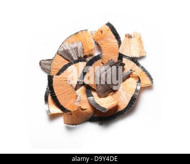 brown eyeliner pencil shavings cut out onto a white background Stock Photo