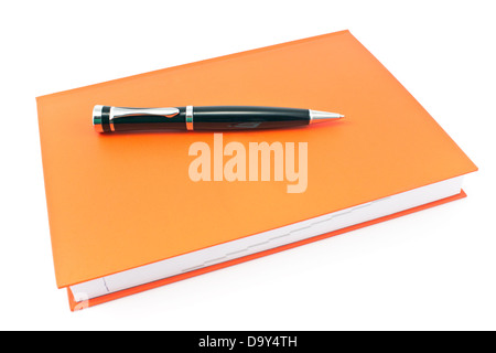 Pen on red notebook isolated on white Stock Photo