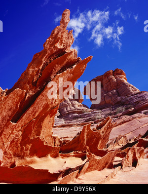 Paper-thin fins wind-eroded Navajo Sandstone with Navajo Sandstone knolls beyond Paria Canyon-Vermilion Cliffs Wilderness Utah Stock Photo