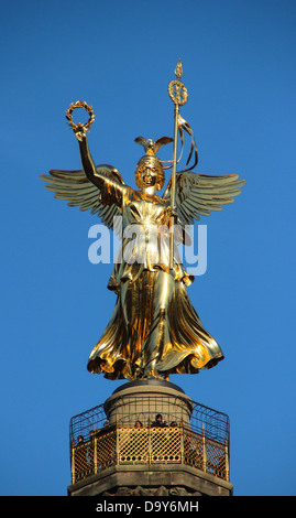 Golden angel of the Column of Victory 'Siegessäule' located in Tiergarten in Berlin, Germany Stock Photo